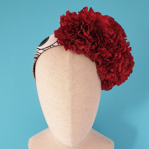 handmade flower crown with red carnations black and white cotton