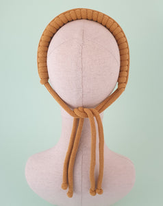 Zulekha Macrame knotted headband in mustard  by Martine Henry Millinery